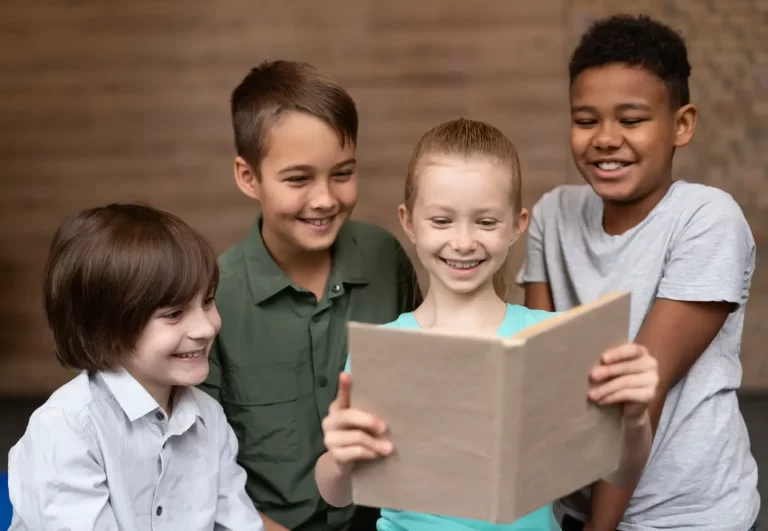 medium-shot-happy-kids-reading-together