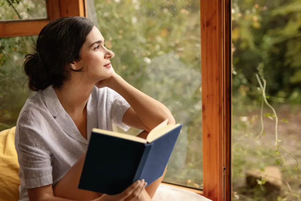 medium-shot-woman-holding-book