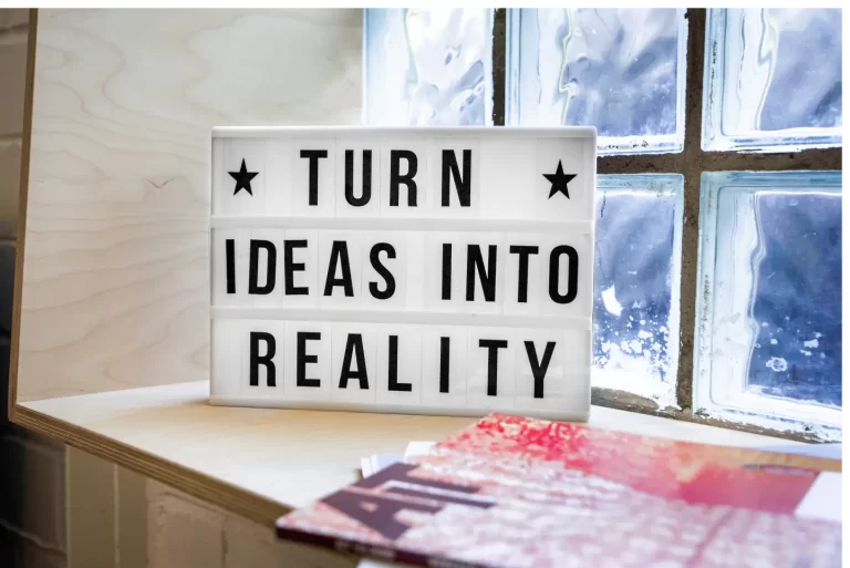 turn-ideas-into-reality-white-signage