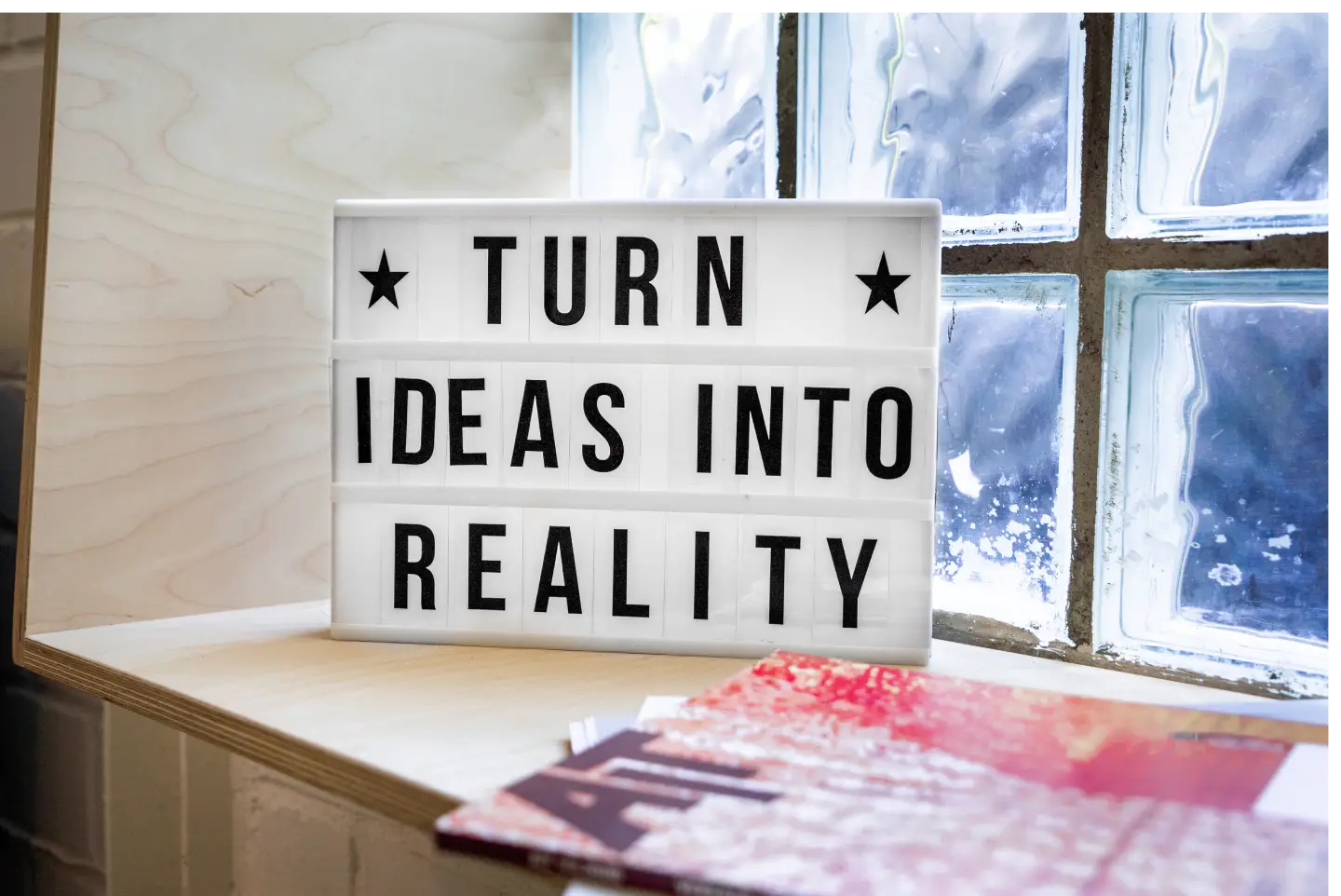 turn-ideas-into-reality-white-signage