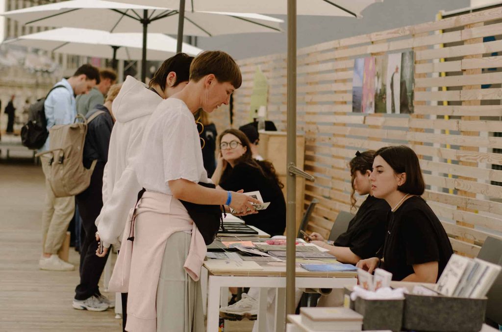 woman-browsing-books-at-table