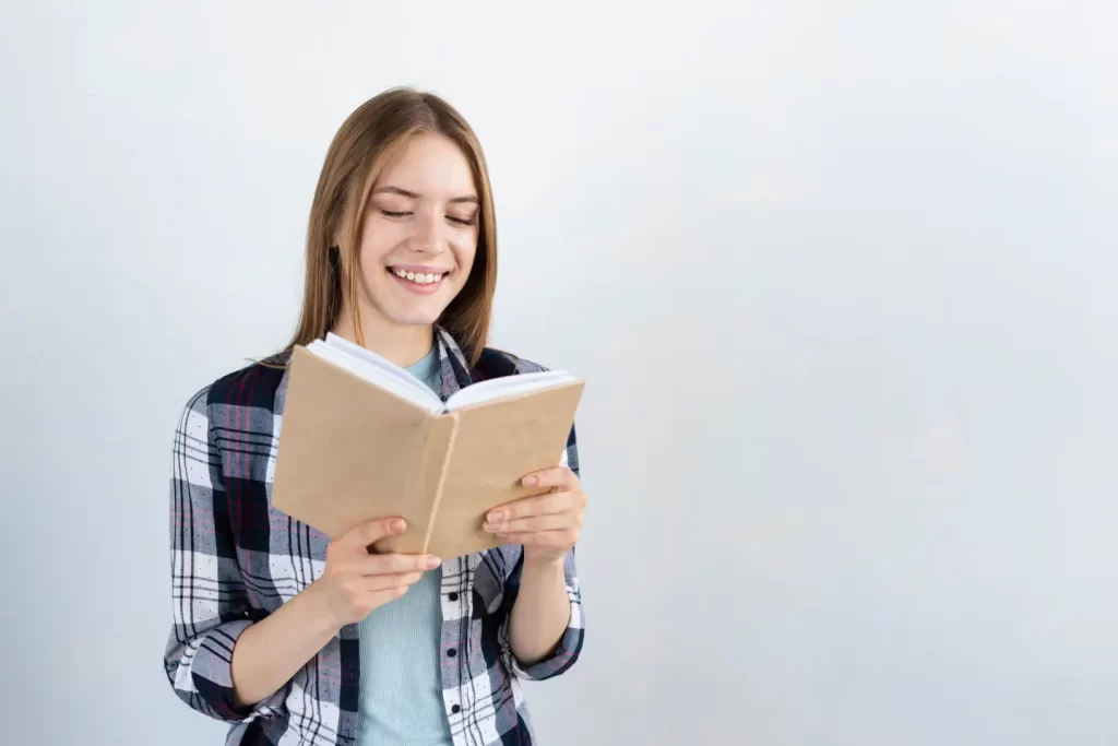 woman-reading-book-with-copy-space