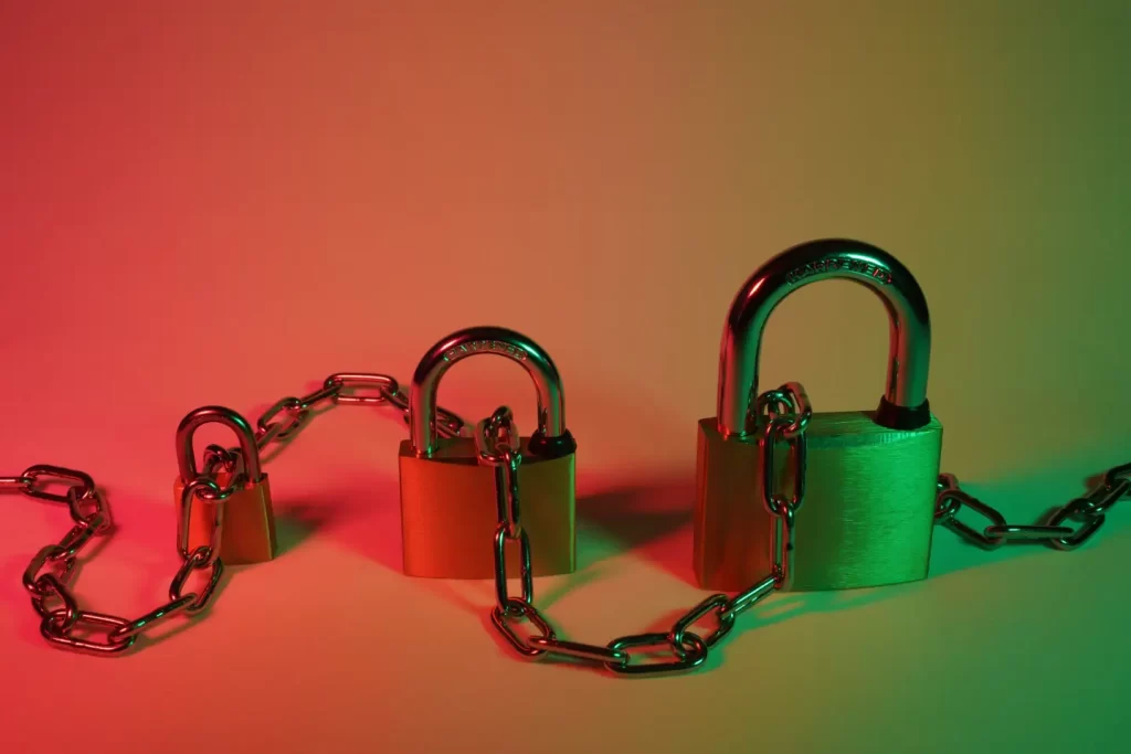 green-padlock-on-pink-surface