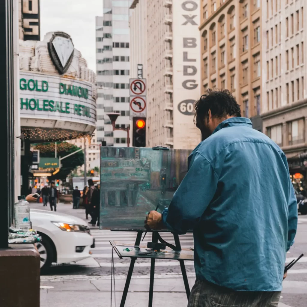 man-painting-the-city