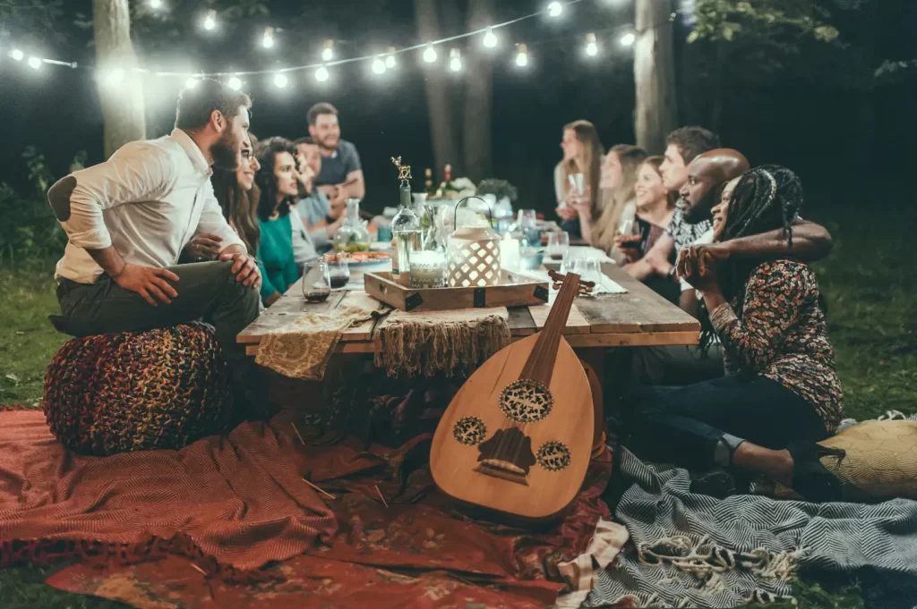 people-sitting-on-chair-in-front-of-table-with-candles-and-candles