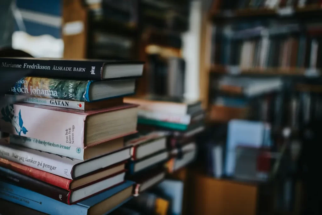 books-on-brown-wooden-shelf