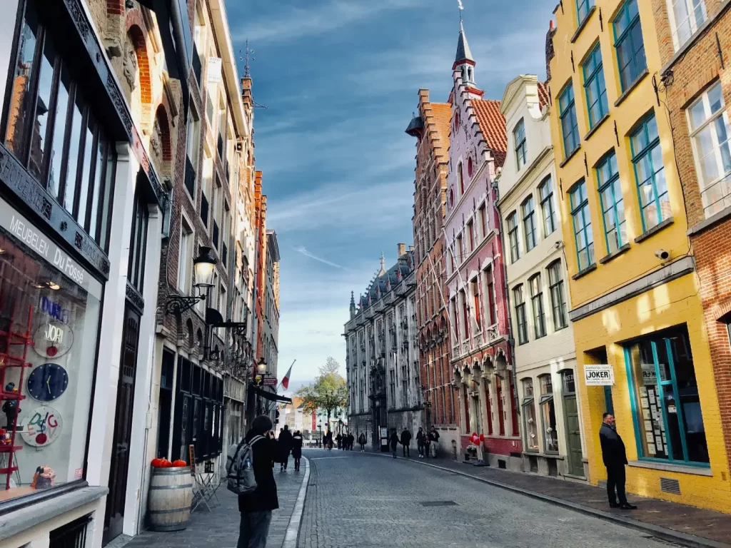 people-walking-on-sidewalk-beside-buildings